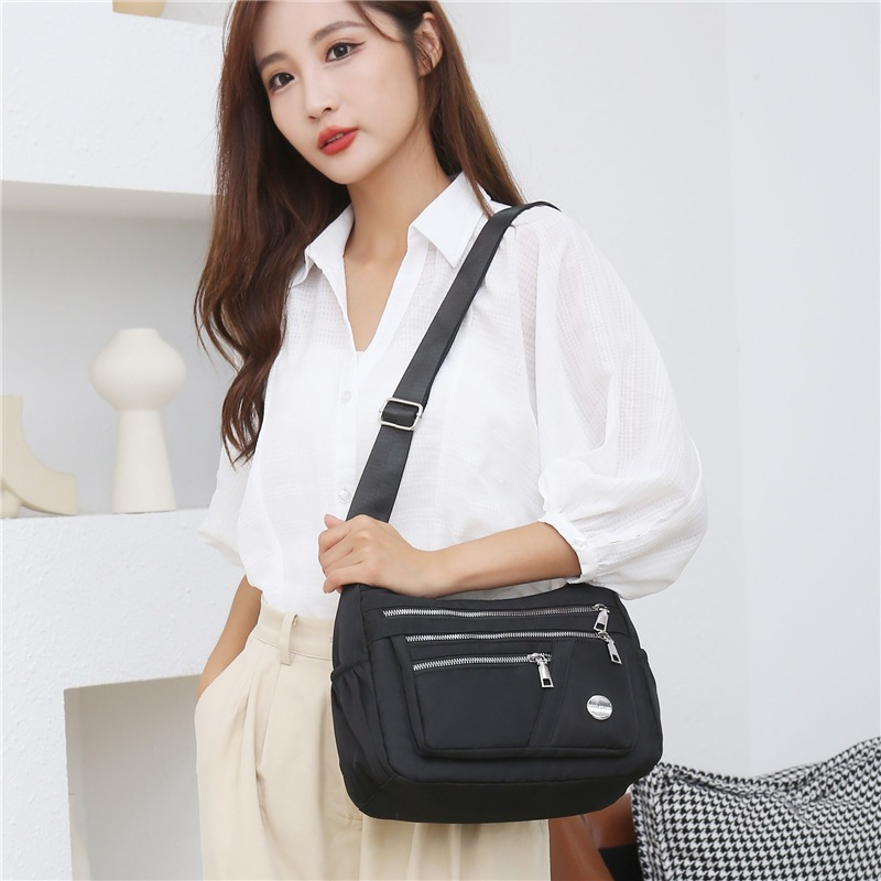 Bolsa Feminina Transversal Impermeável Nylon Tiracolo Boa Qualidade Compacto xiuxianxilie ref: b112